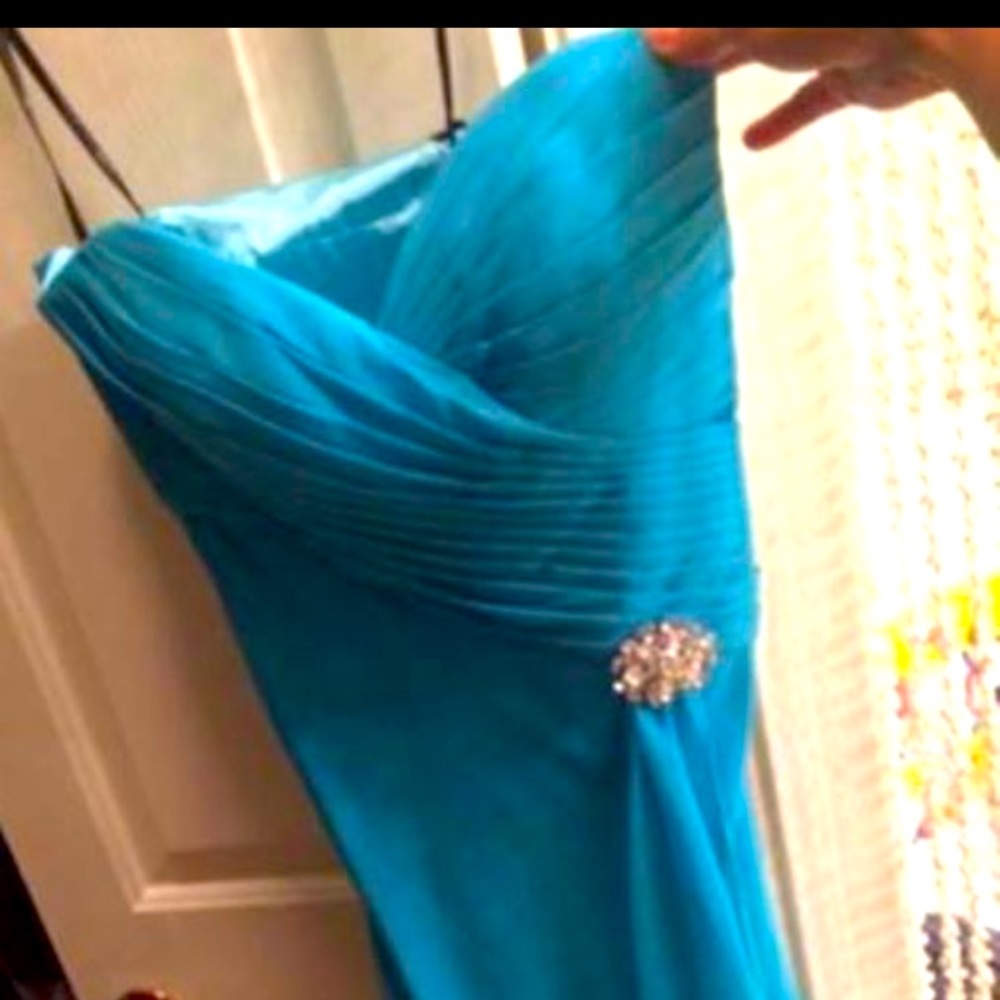 Formal evening dress. New never worn. Size 4.